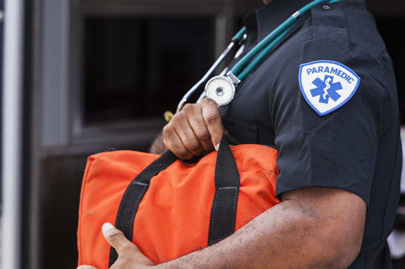 Paramedic Caring a Medical Bag